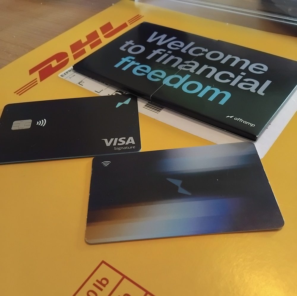 Photograph of 2 Offramp cards above the DHL envelope in which they were sent.
