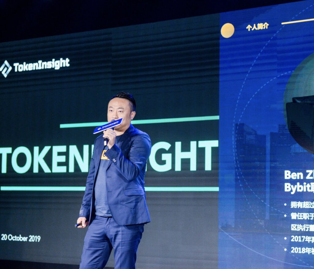 Ben Zhou, co-founder and CEO of Bybit, speaking on stage at the TokenInsight event.
